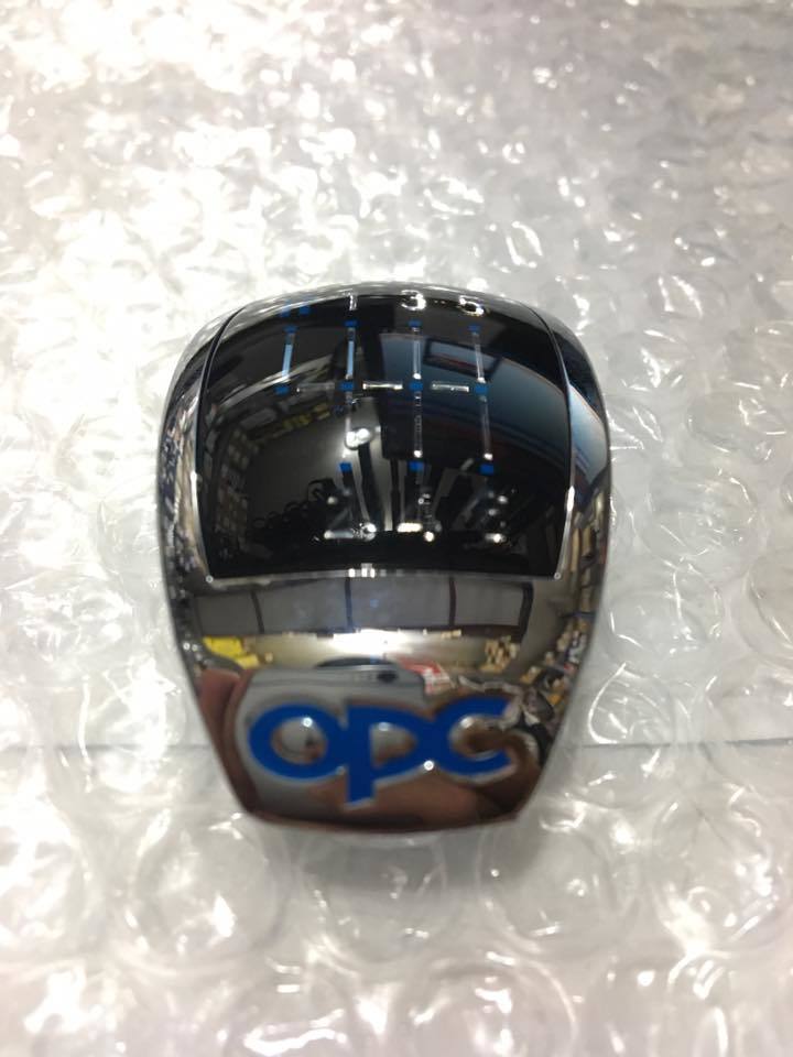 ASTRA H OPC VİTES TOPUZ BAŞLIĞI (PLAKETİ)